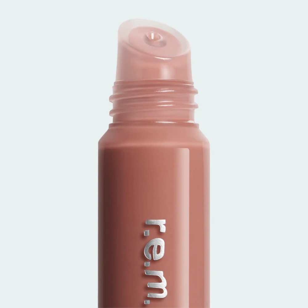 on your collar plumping lip gloss in detention (cool nude)